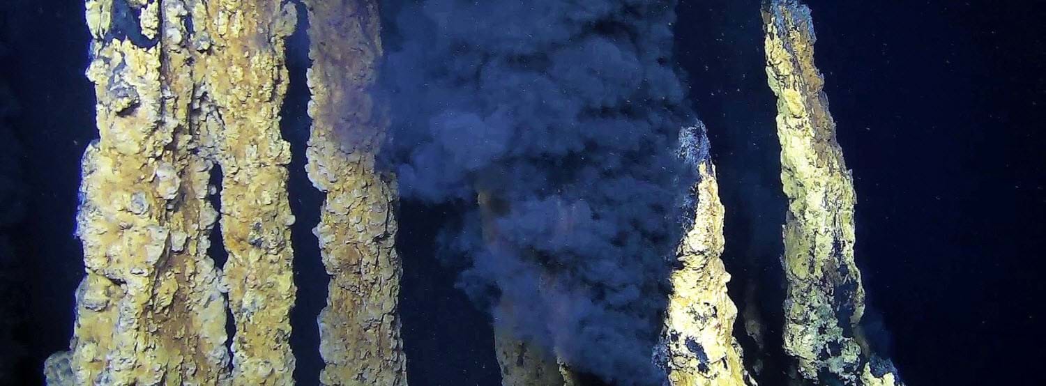 Black smoker chimneys at the Fåvne hydrothermal vent field, Arctic Mid-Ocean Ridge. Photo: Trond Mohn Centre for Deep-Sea Research/University of Bergen.